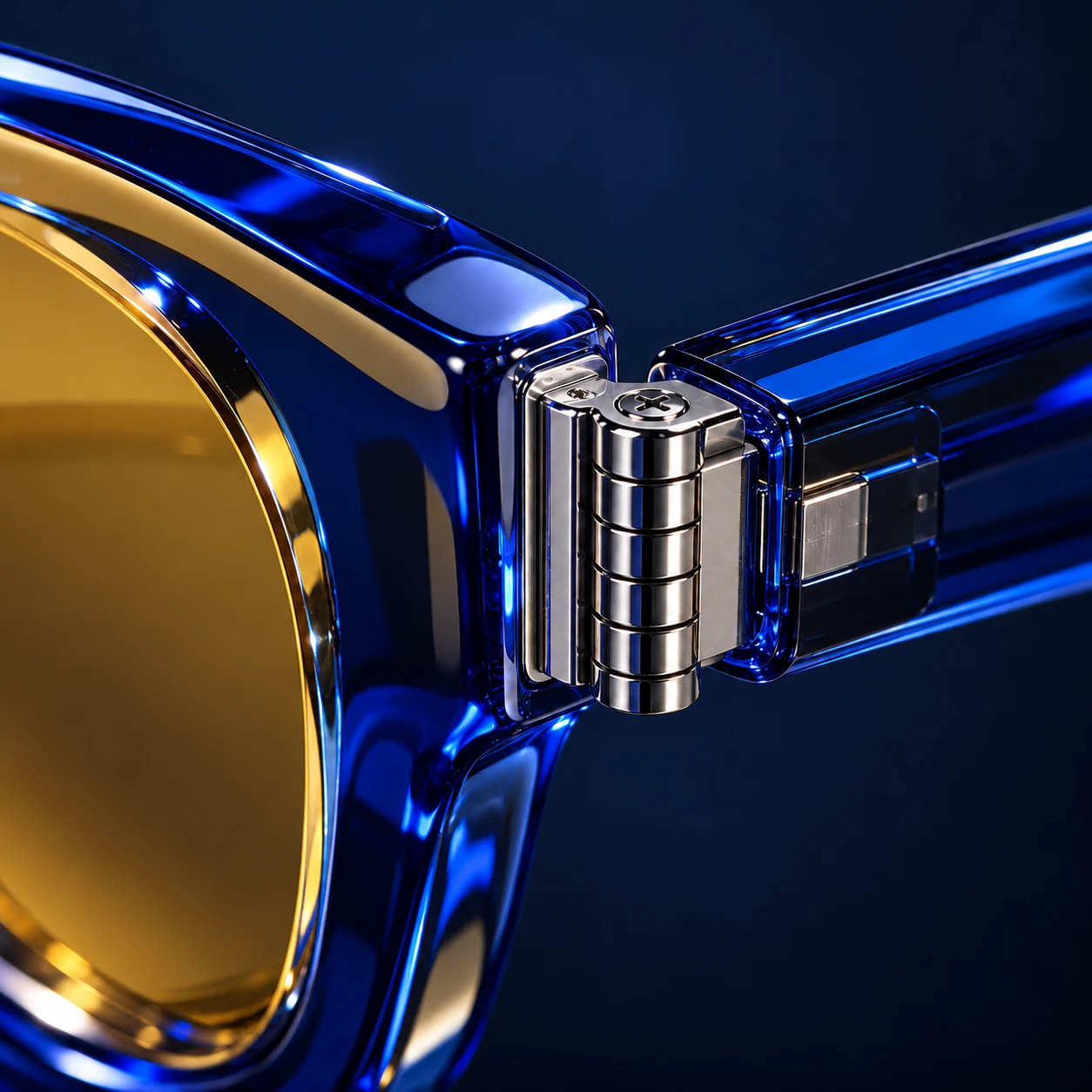 Close-up of the polished steel hinge on the cobalt frame
